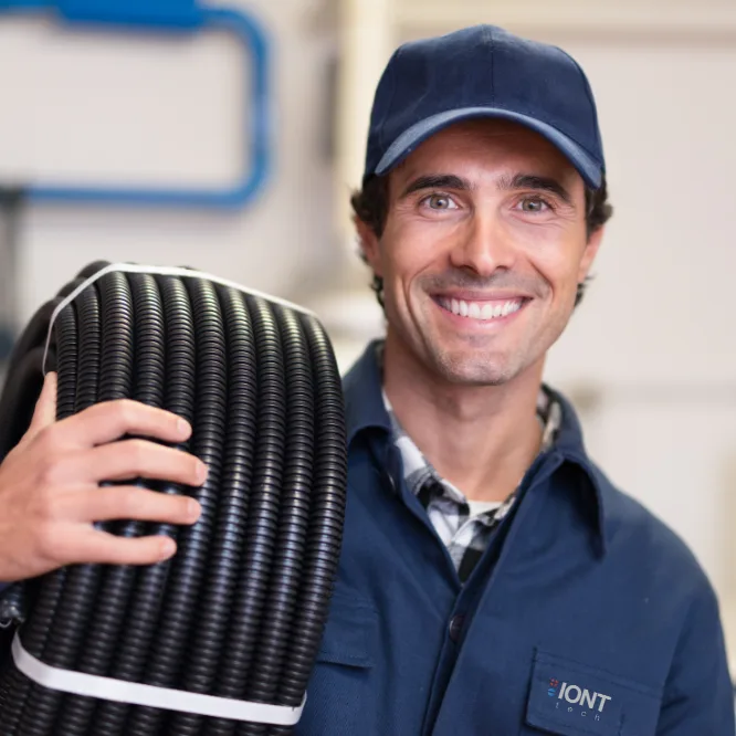 Service technician with cabling for a charging station